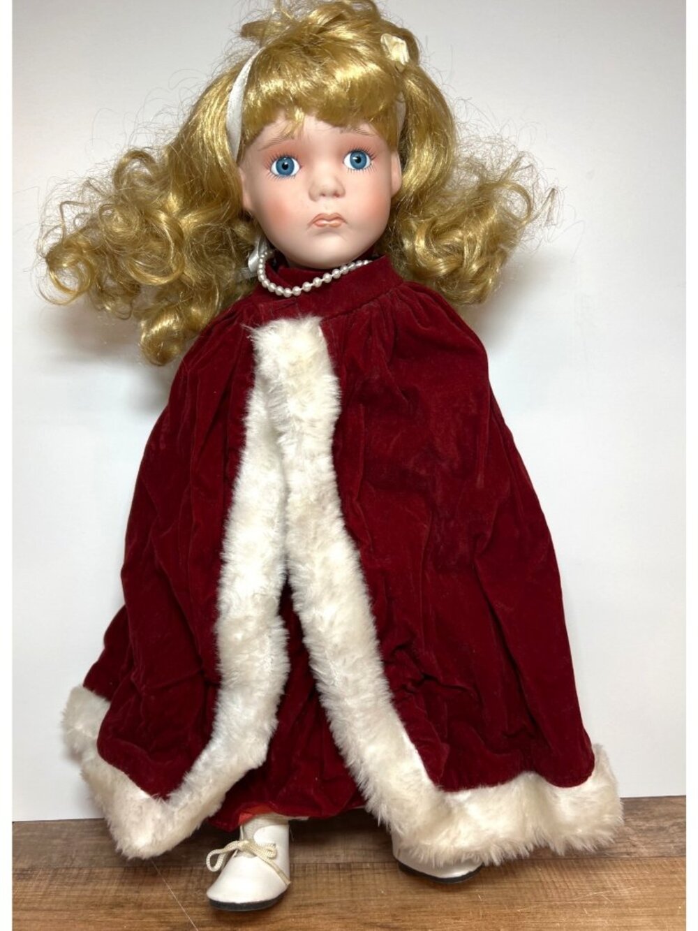 Porcelain Doll In Red Velvet Dress & Faux Fur Cape
